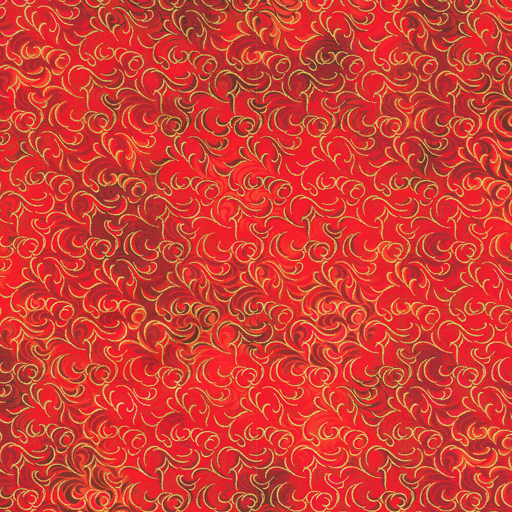 Red and metallic gold intricate swirling patterned cotton fabric