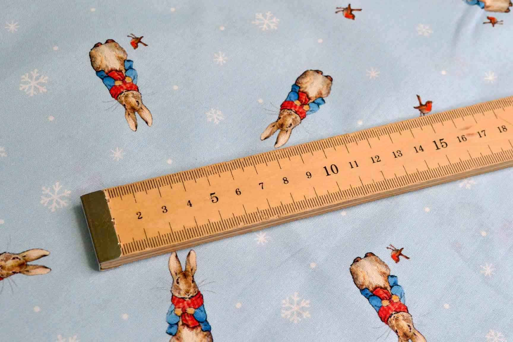 Peter Rabbit Christmas Traditions Blue, Craft Cotton Co