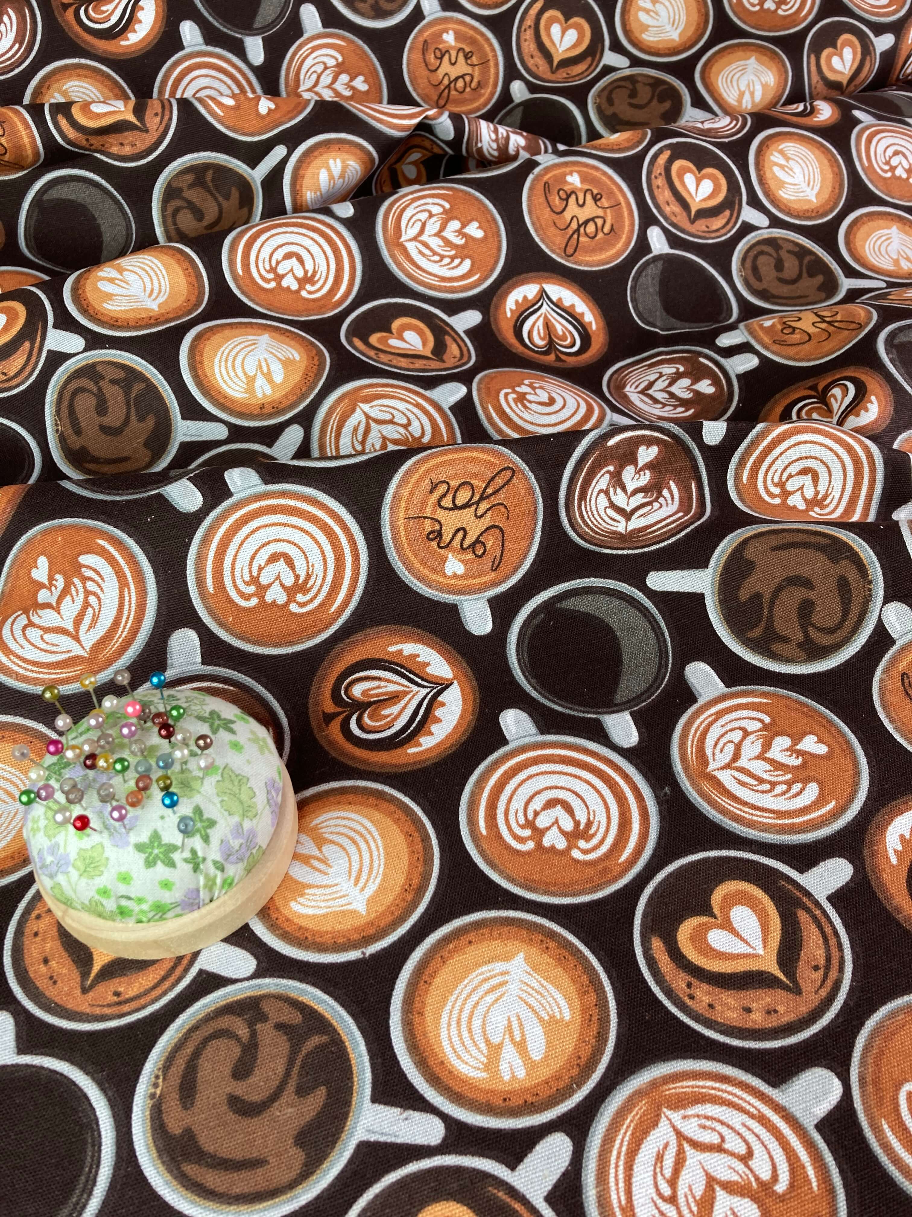 coffee cups with latte art on brown half panama poly-cotton