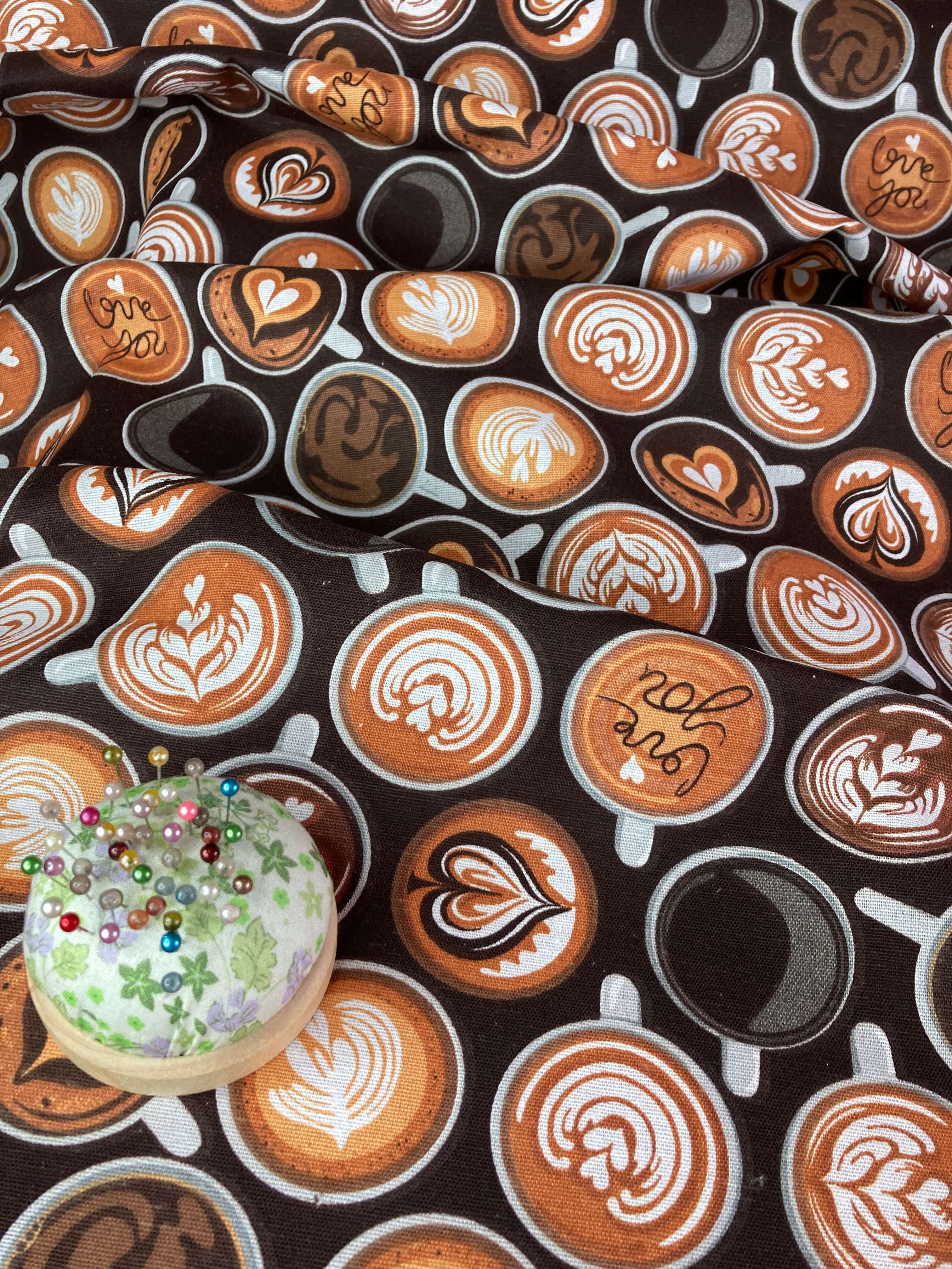 coffee cups with latte art on brown half panama poly-cotton