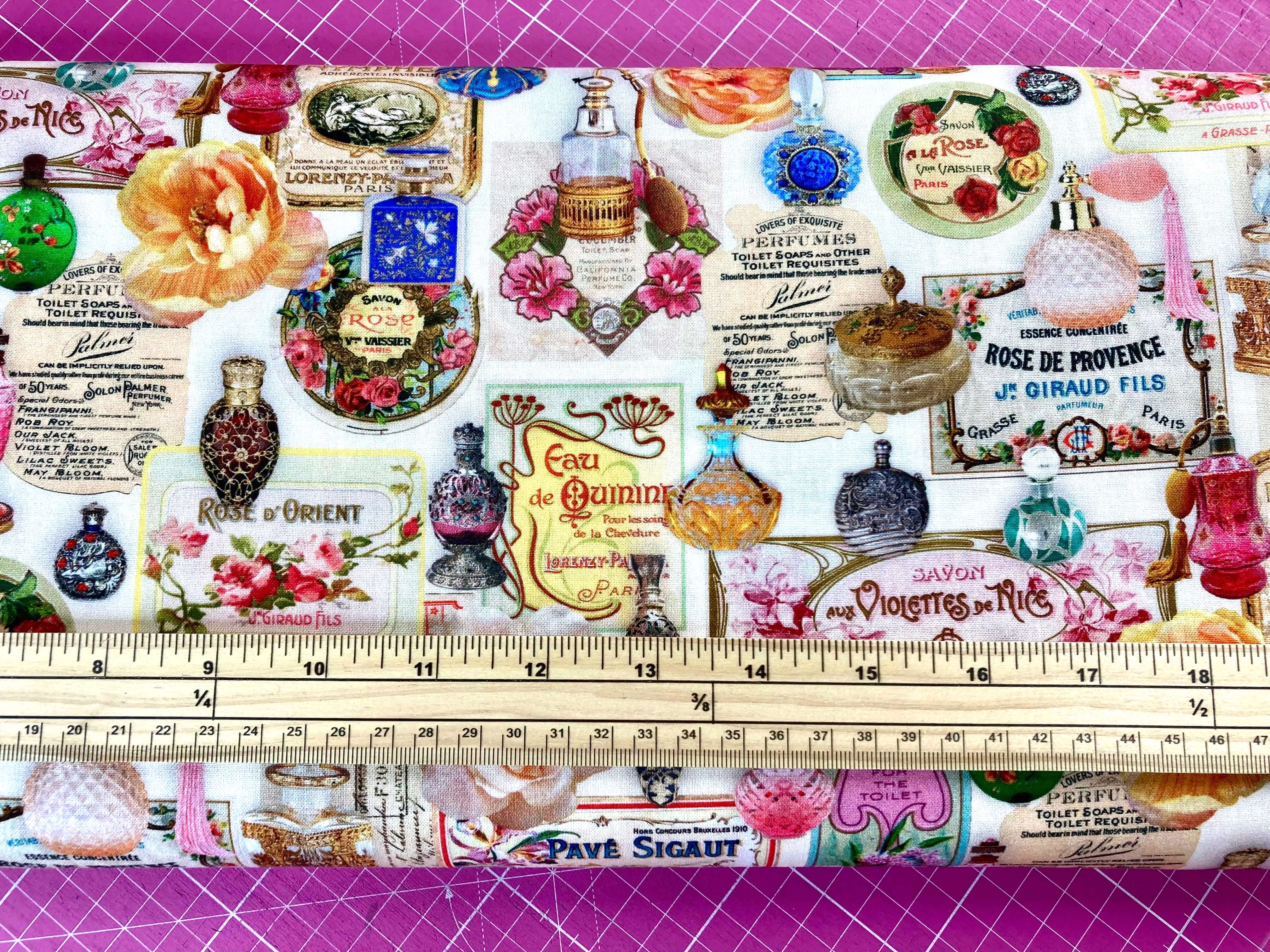 colourful vintage perfume bottles fabric