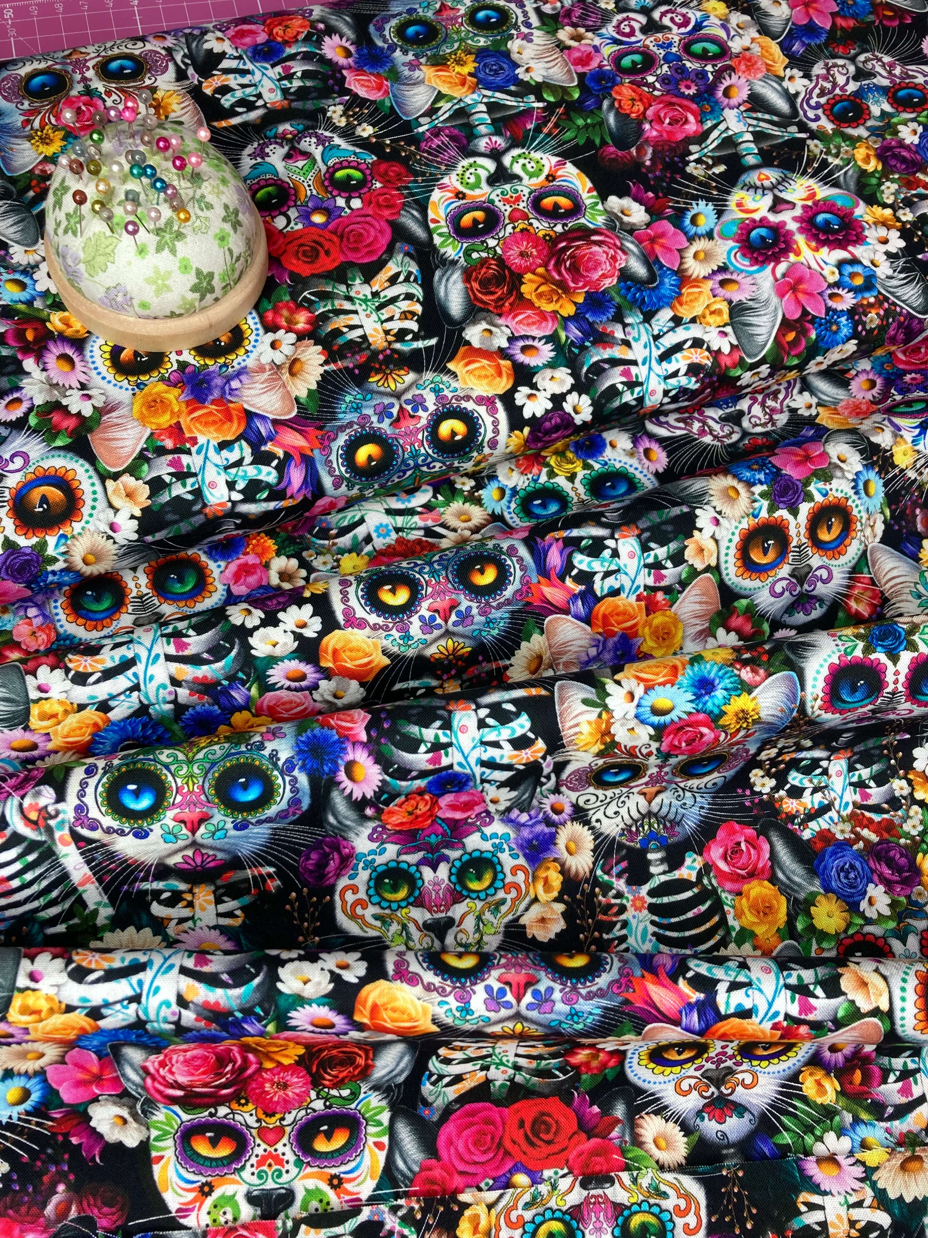 vibrant colourful flowers and day of the dead cats halloween fabric